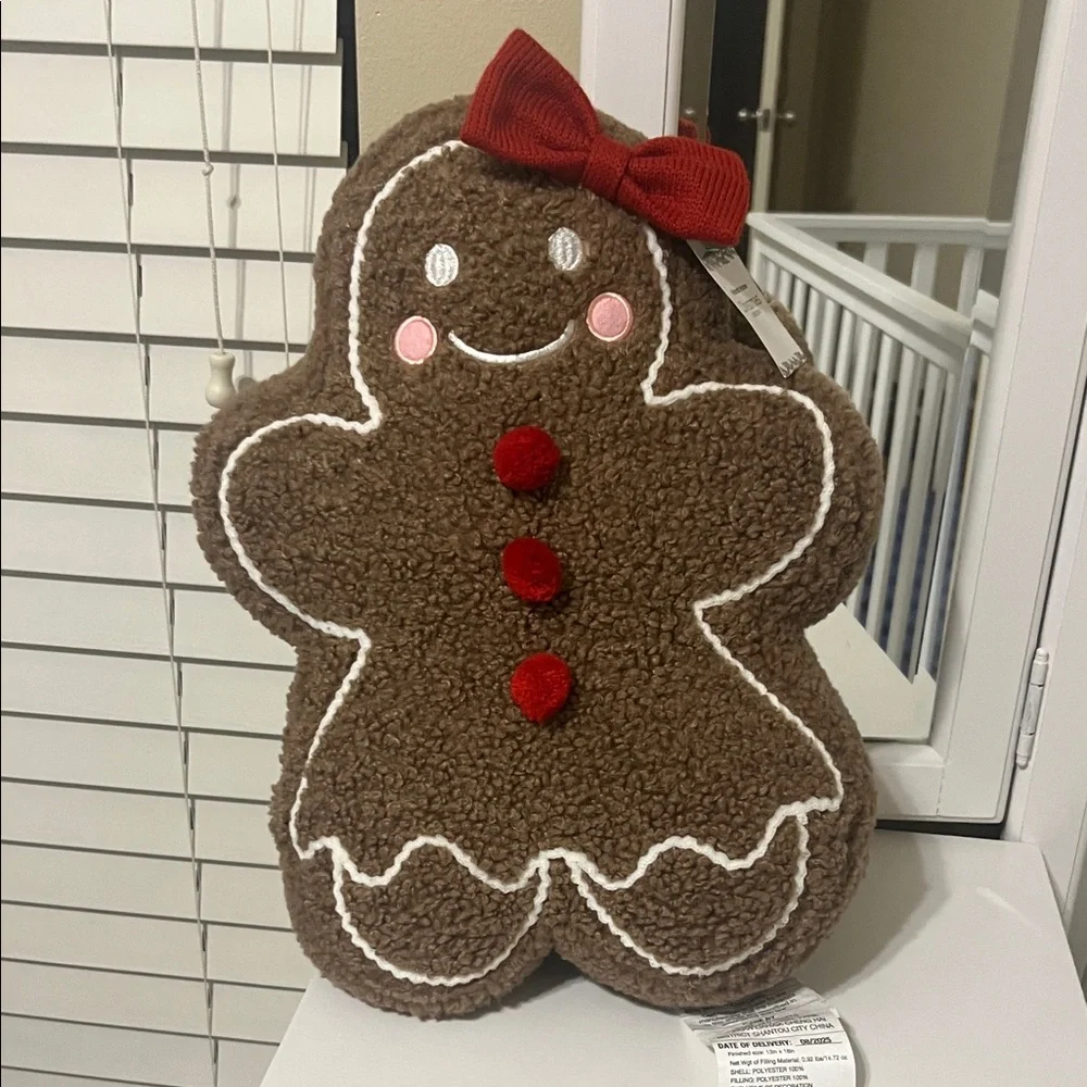 Brown Gingerbread Man Plush with Red Accents pillow